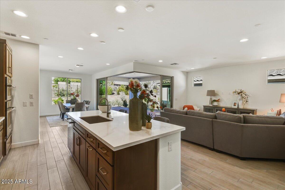 29008 North Juventino Way Rio Verde, AZ 85263 - Photo 16 of 50 a kitchen with counter top space and living room
