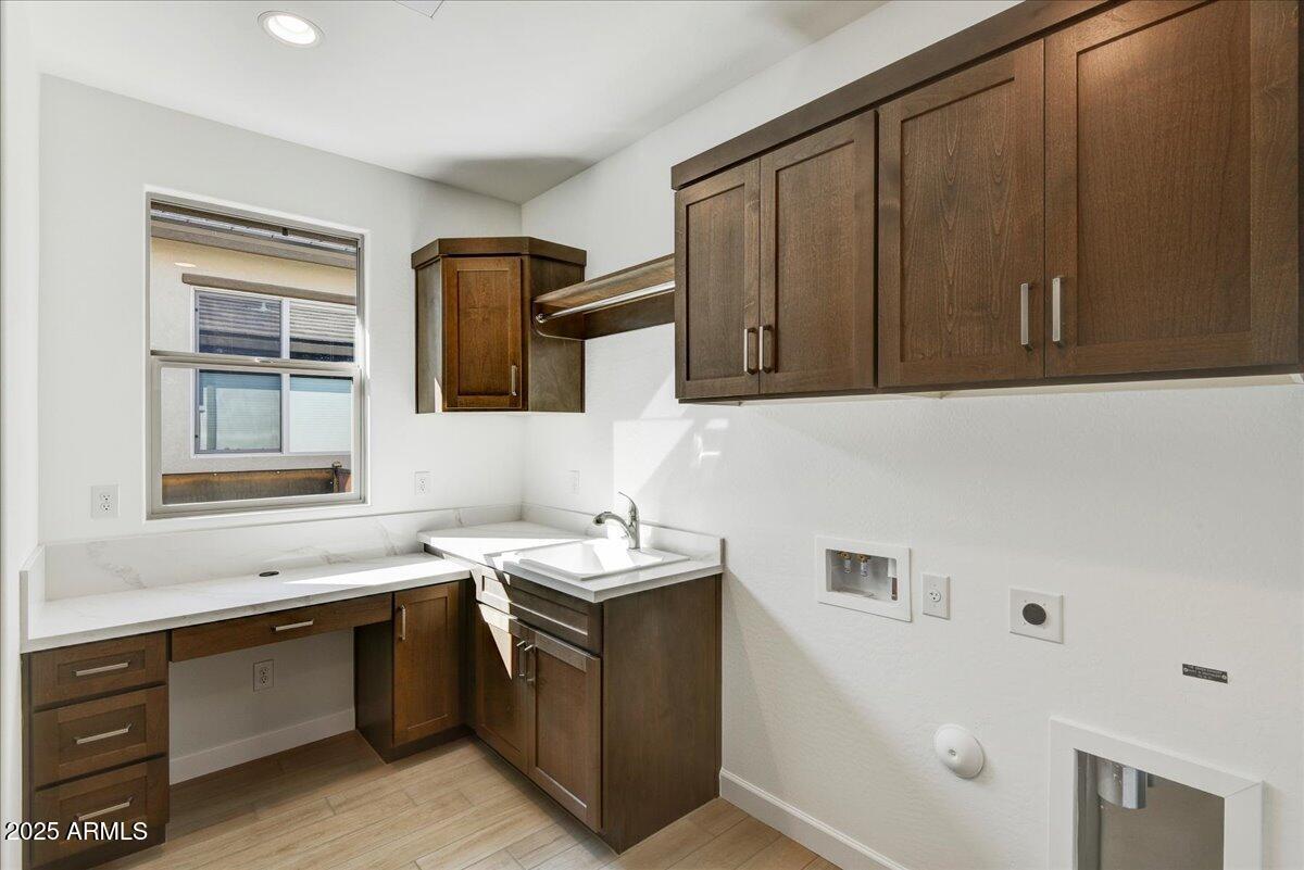 29008 North Juventino Way Rio Verde, AZ 85263 - Photo 17 of 50 a kitchen with a sink cabinets and a window