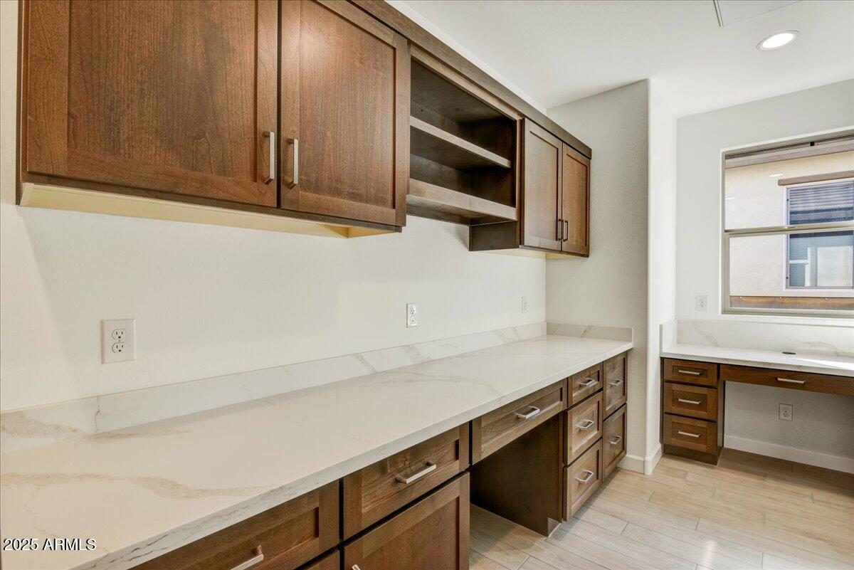 29008 North Juventino Way Rio Verde, AZ 85263 - Photo 18 of 50 a kitchen with stainless steel appliances a stove and a microwave