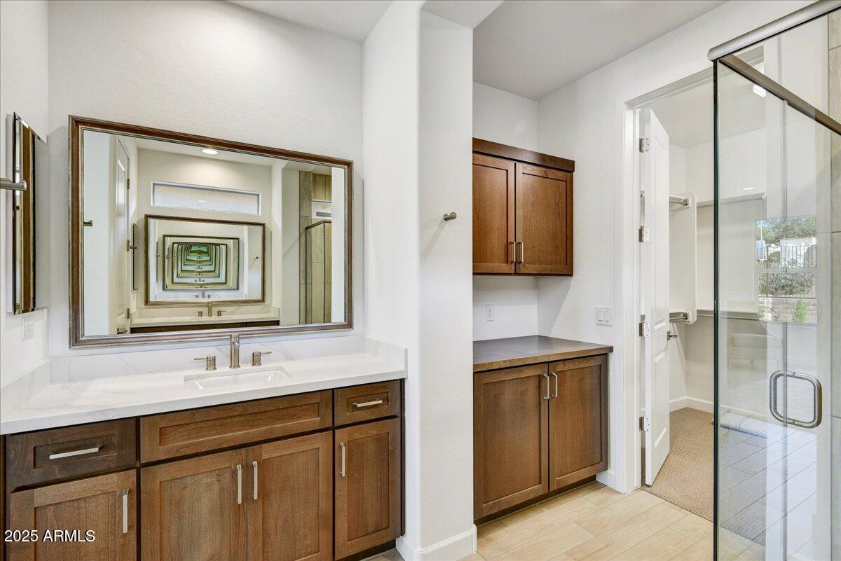 29008 North Juventino Way Rio Verde, AZ 85263 - Photo 23 of 50 a bathroom with a sink and a mirror