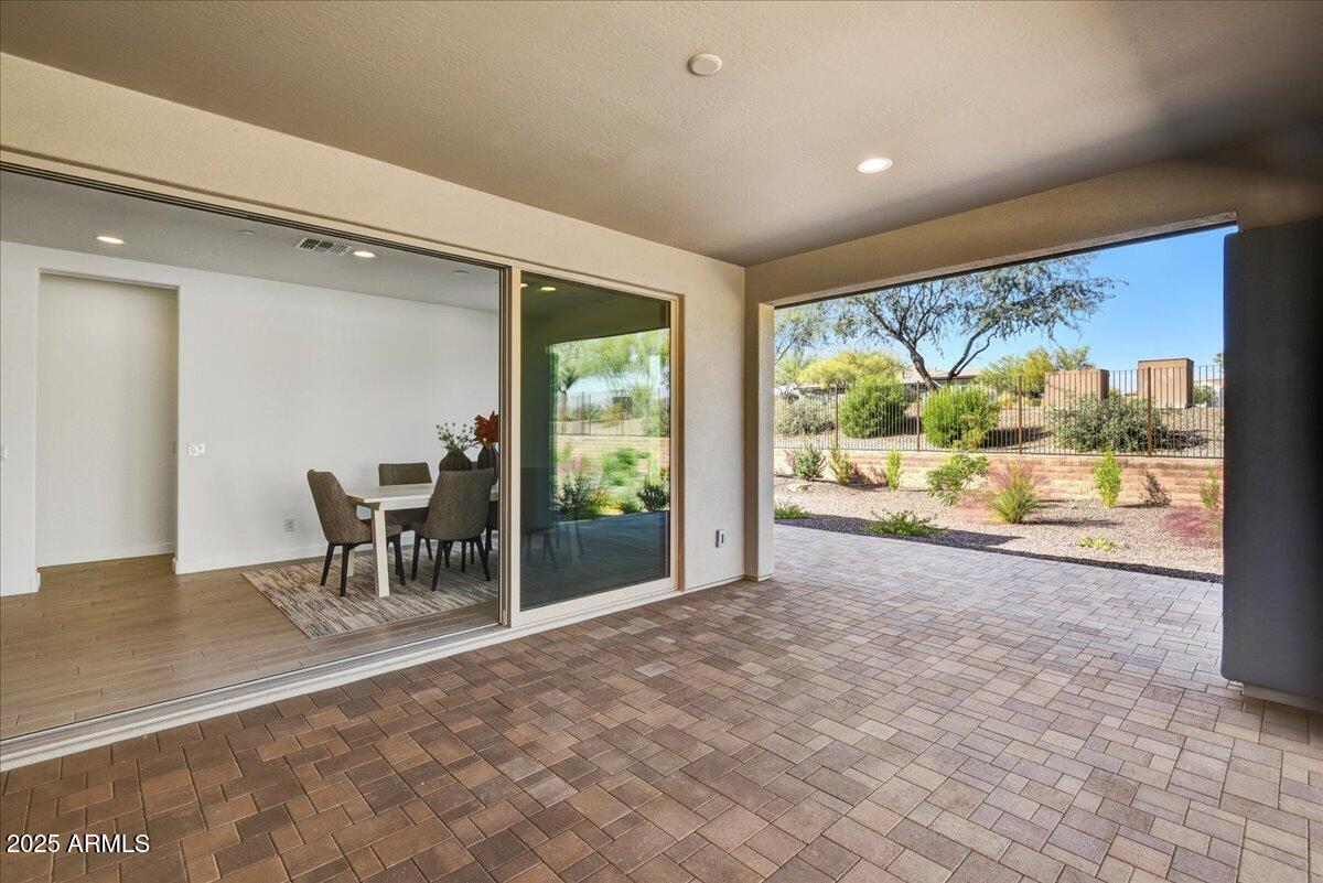 29008 North Juventino Way Rio Verde, AZ 85263 - Photo 25 of 50 a view of a work space with wooden floor and a floor to ceiling window