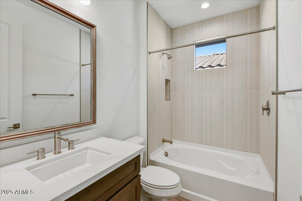 29008 North Juventino Way Rio Verde, AZ 85263 - Photo 5 of 50 a bathroom with a bathtub shower sink vanity and toilet