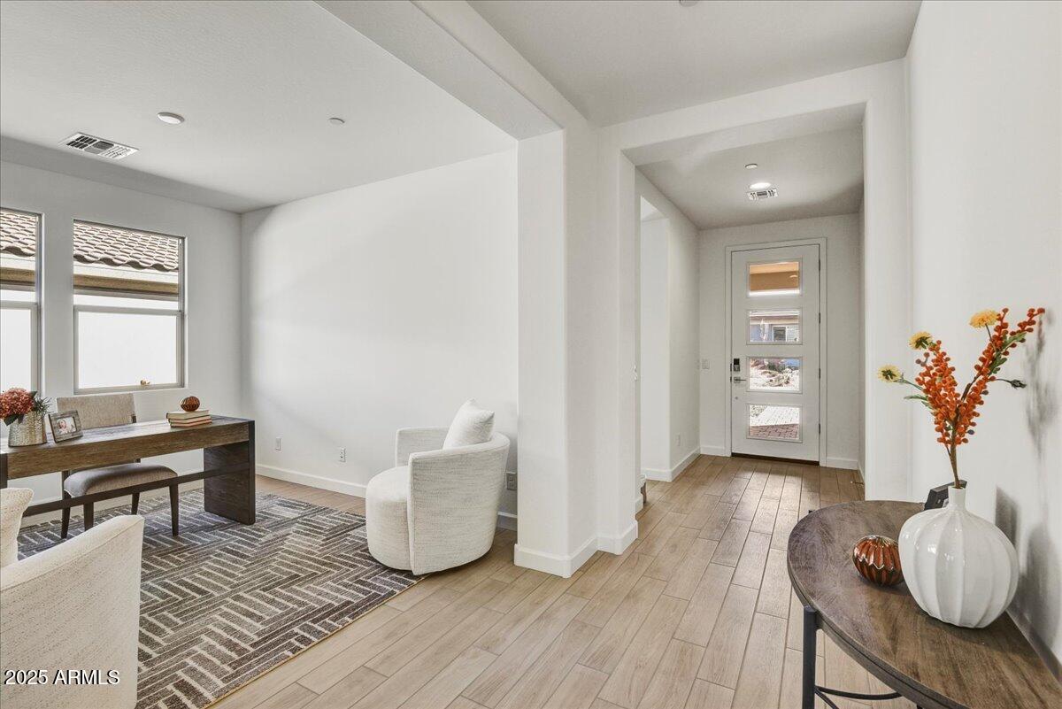 29008 North Juventino Way Rio Verde, AZ 85263 - Photo 6 of 50 a living room with furniture and wooden floor