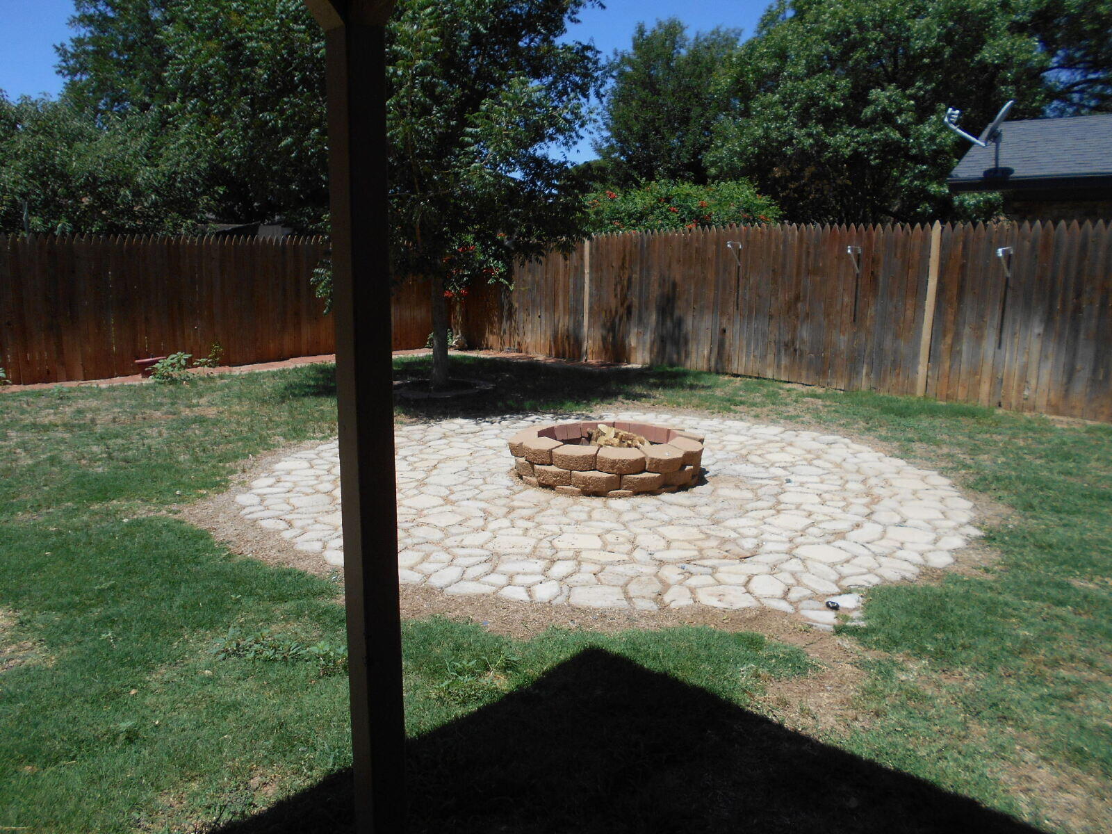 4431 77th Street Lubbock, TX 79424 - Photo 18 of 19 a view of a backyard of the house