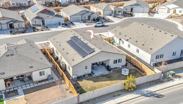 a view of a garage and car parked