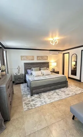 a view of bedroom and bathroom