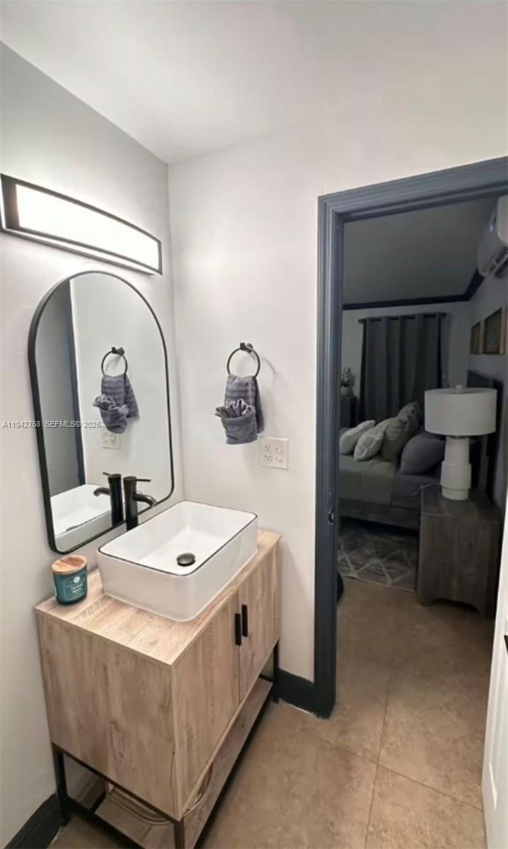 747 East 19th Street Hialeah, FL 33013 - Photo 18 of 37 a living room with furniture and a mirror