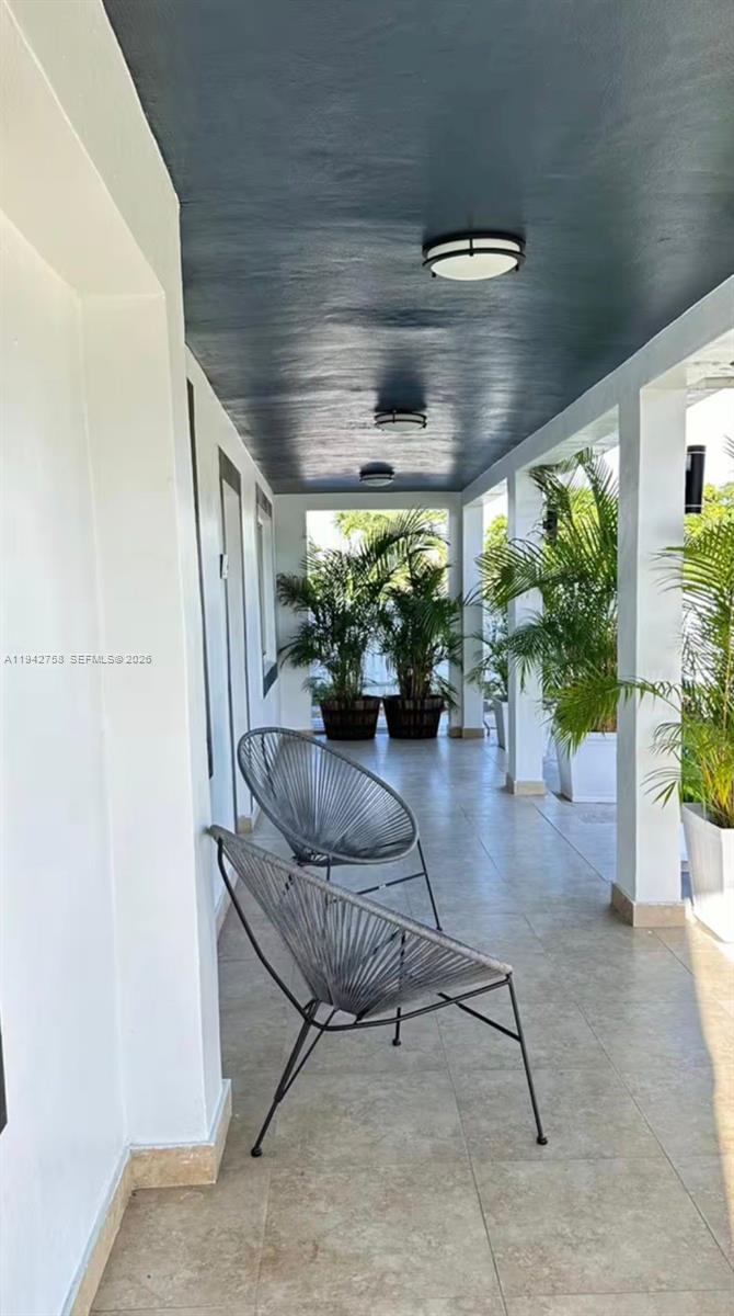 747 East 19th Street Hialeah, FL 33013 - Photo 27 of 37 a living room with furniture and a large window