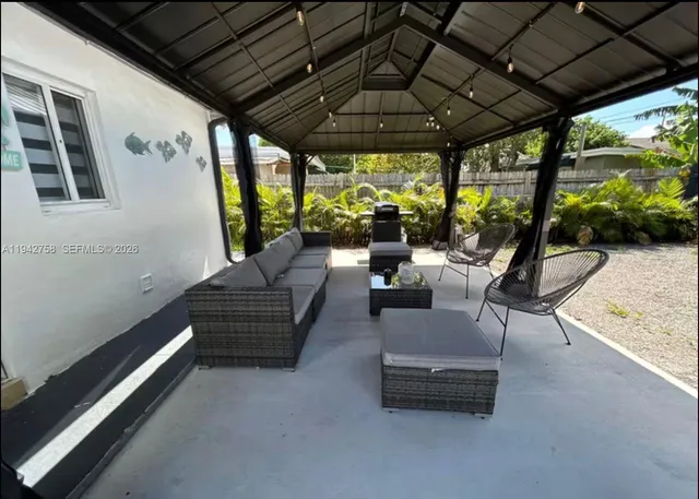 a building outdoor space with patio furniture