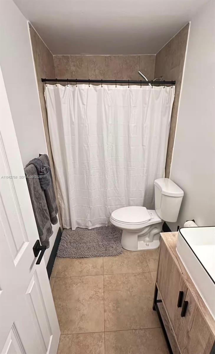 747 East 19th Street Hialeah, FL 33013 - Photo 34 of 37 a bathroom with a sink toilet and shower