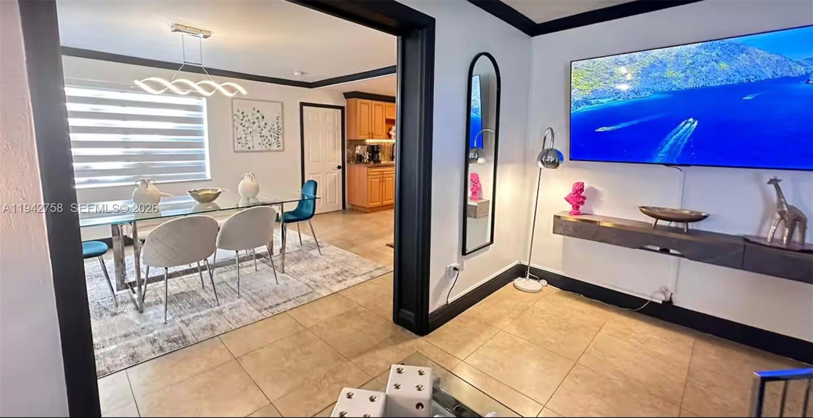 747 East 19th Street Hialeah, FL 33013 - Photo 7 of 37 a view of a living room and bathroom