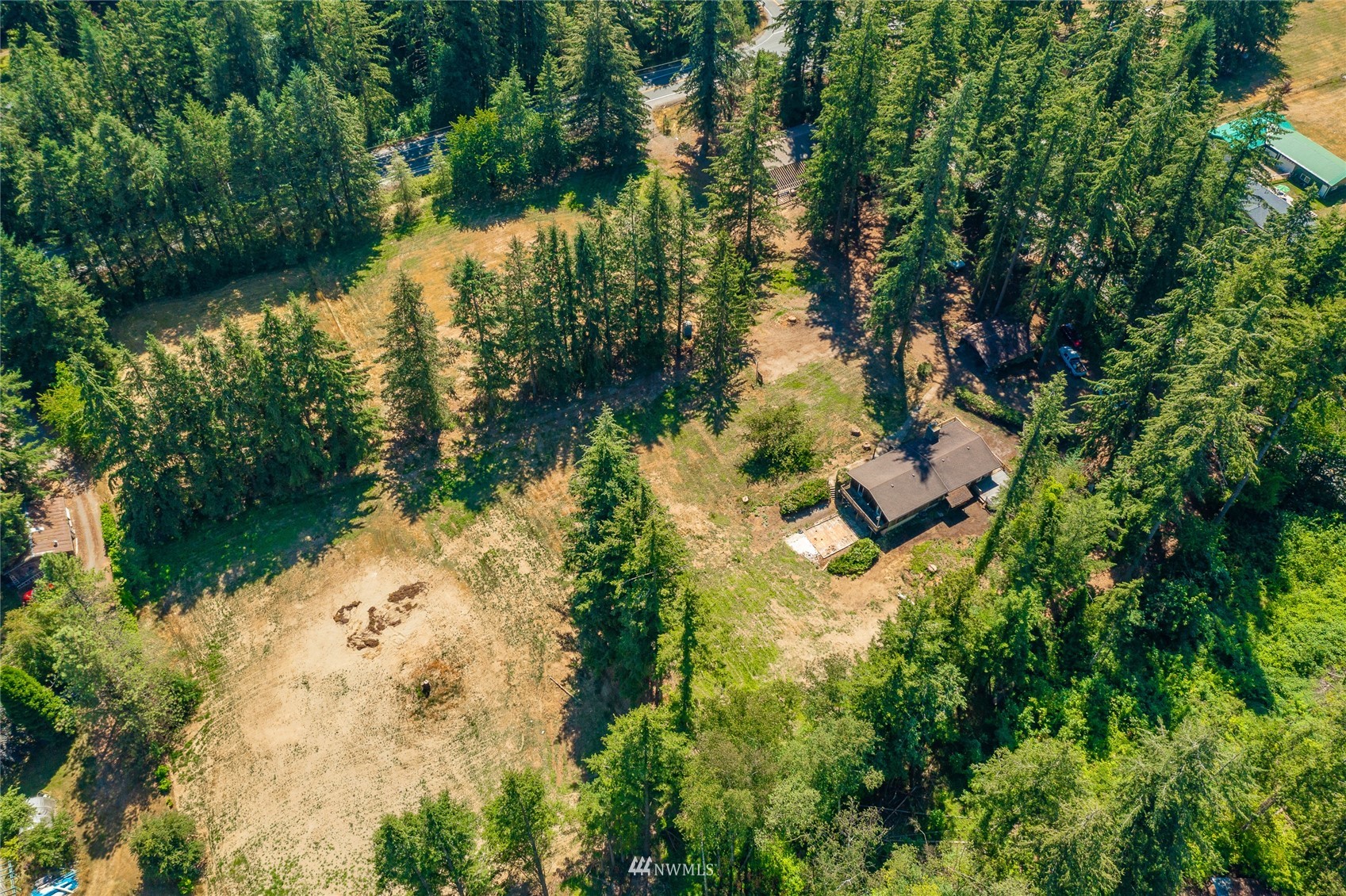 8128 Custer School Road Custer, WA 98240 - Photo 2 of 39 a backyard of a house with a yard and lake view