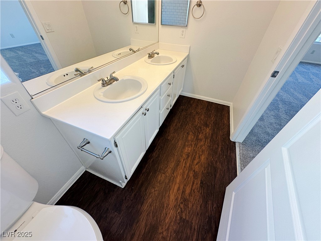 181 Ruby Ridge Avenue Henderson, NV 89002 - Photo 27 of 44 Bathroom with wood finished floors and double vanity