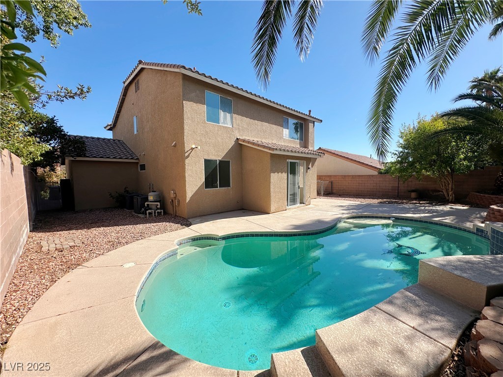 181 Ruby Ridge Avenue Henderson, NV 89002 - Photo 41 of 44 View of swimming pool featuring a fenced backyard and a patio area