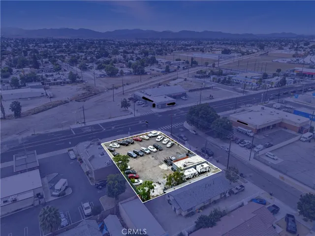 a view of water heater room with furniture and a fireplace