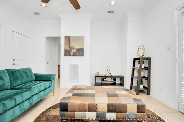 a bedroom with a bed and dresser