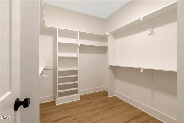 a view of an empty walk in closet