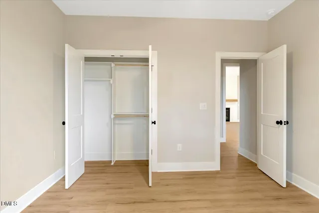 a view of entryway with wooden floor