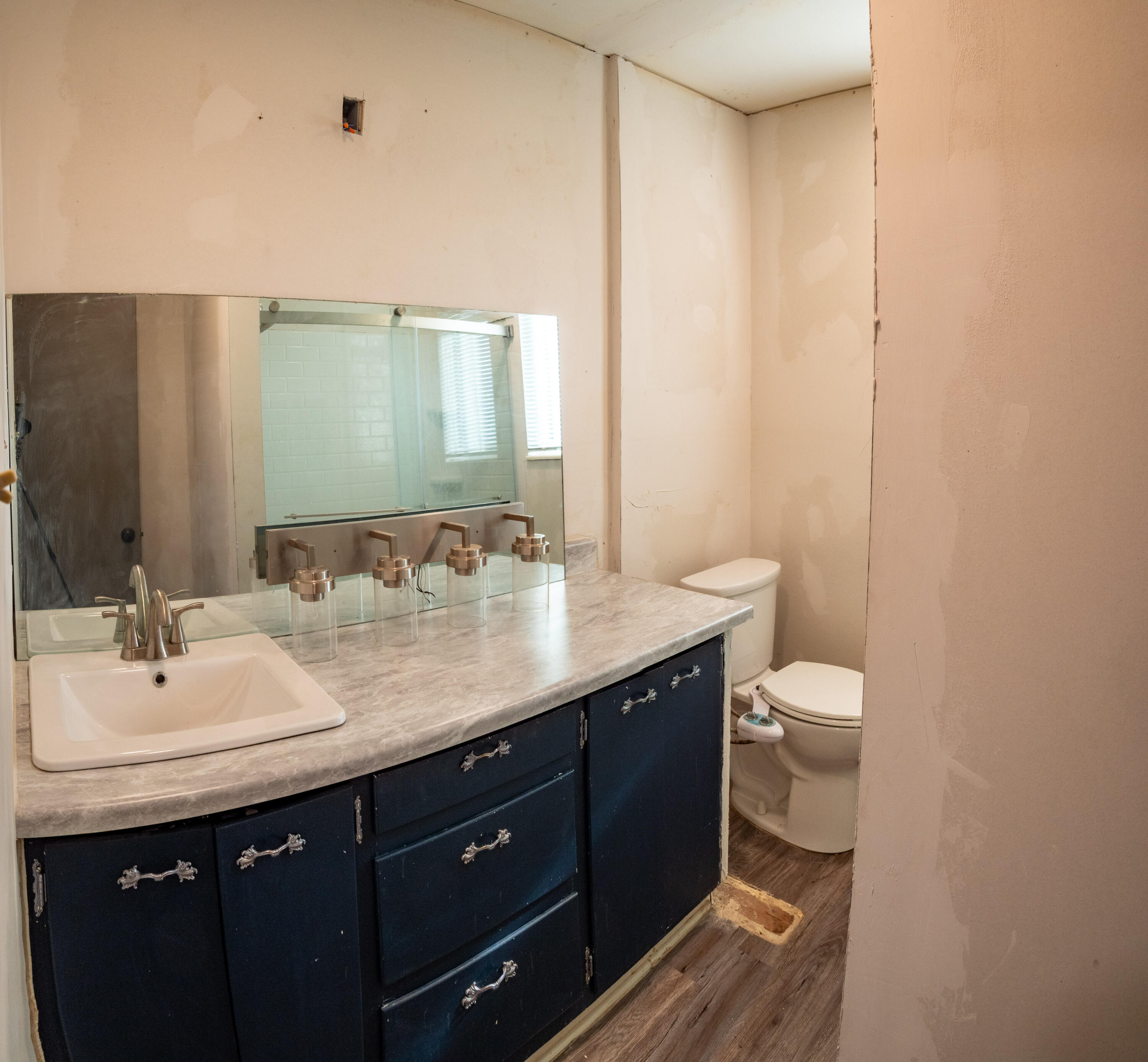 1131 County Road 125 Post, TX 79356 - Photo 18 of 27 a bathroom with a sink and a mirror