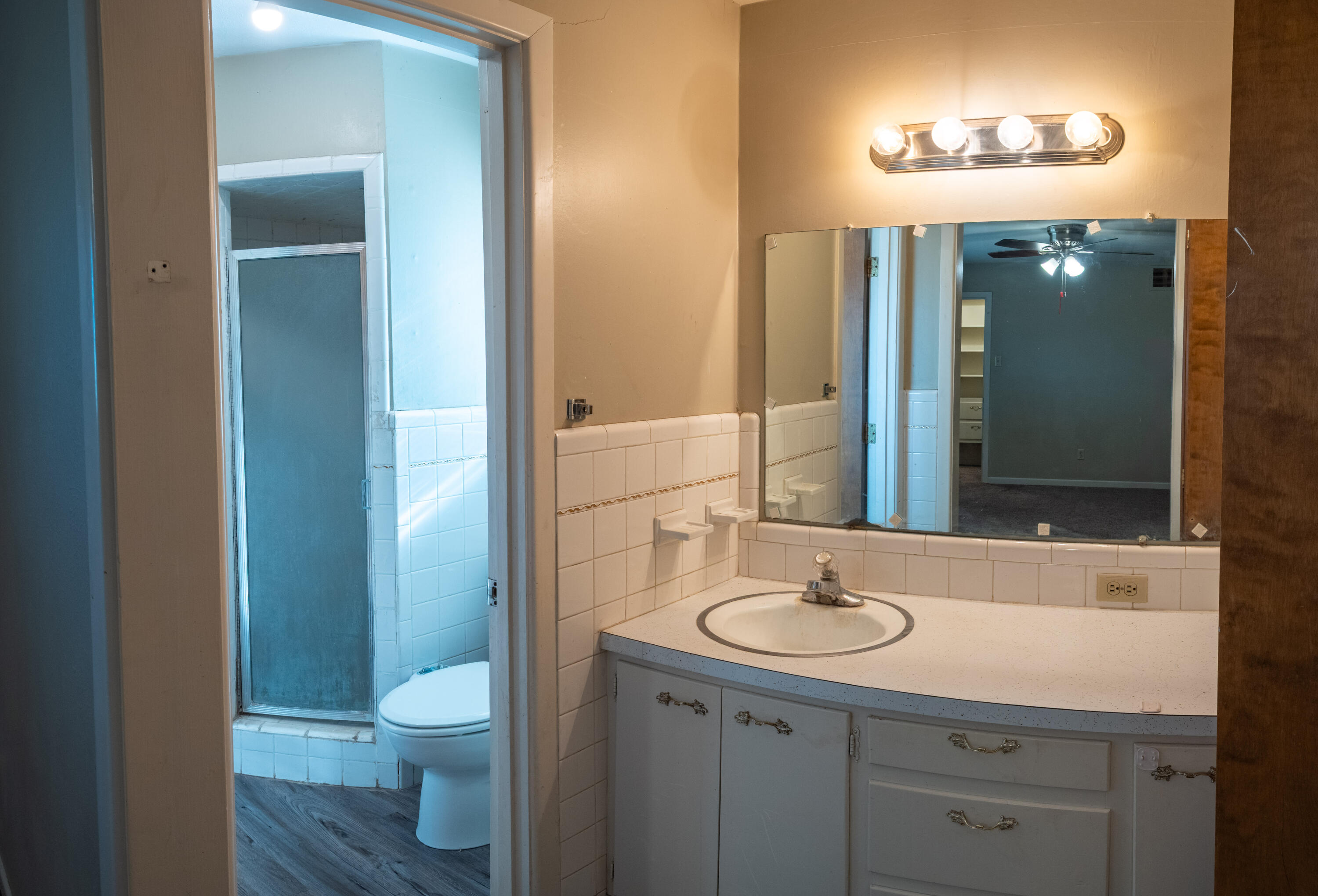 1131 County Road 125 Post, TX 79356 - Photo 23 of 27 a bathroom with a sink and a mirror