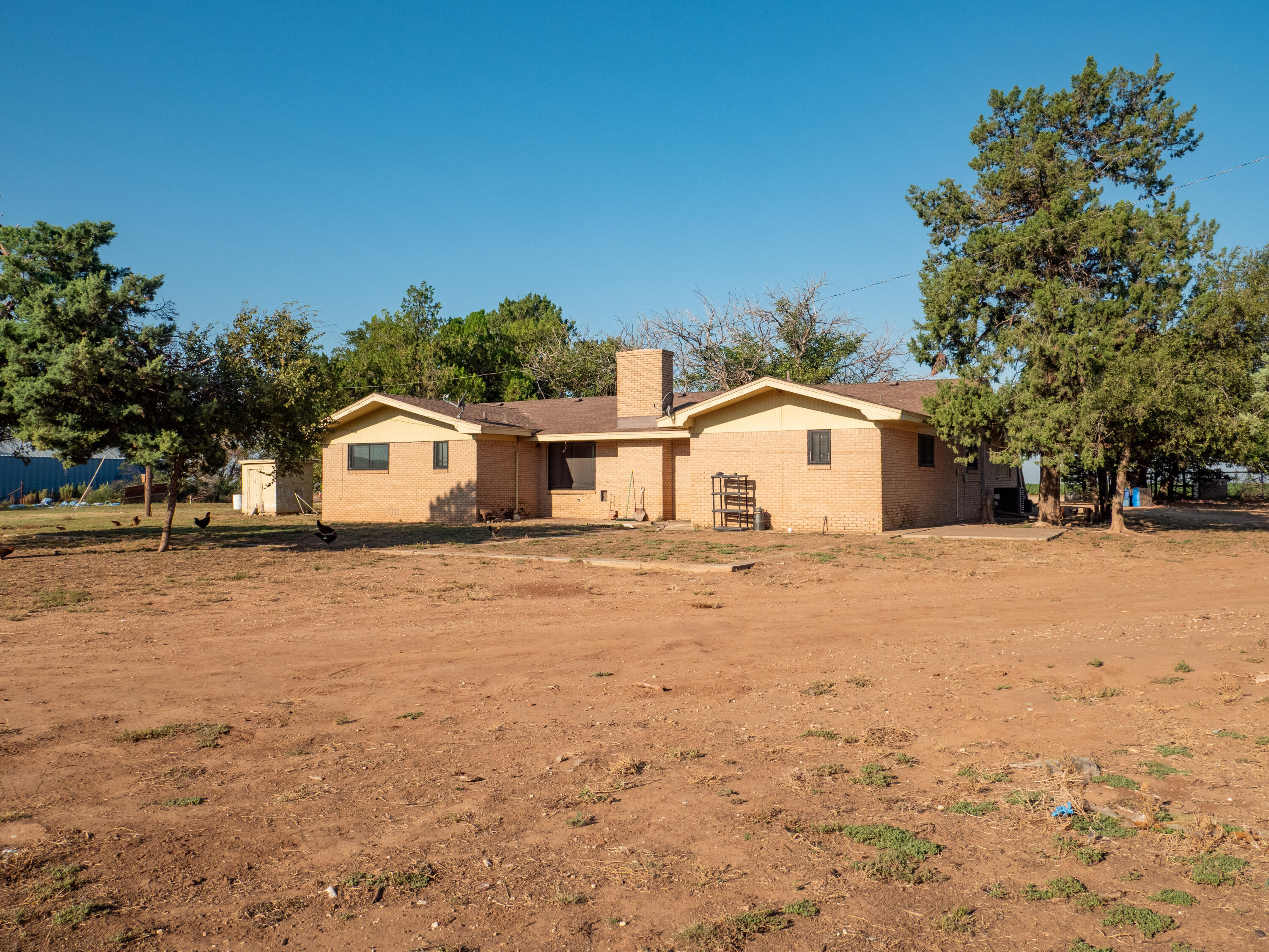 1131 County Road 125 Post, TX 79356 - Photo 7 of 27 a house view with a outdoor space