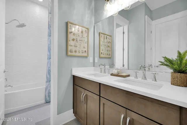 a kitchen with a sink stove and refrigerator