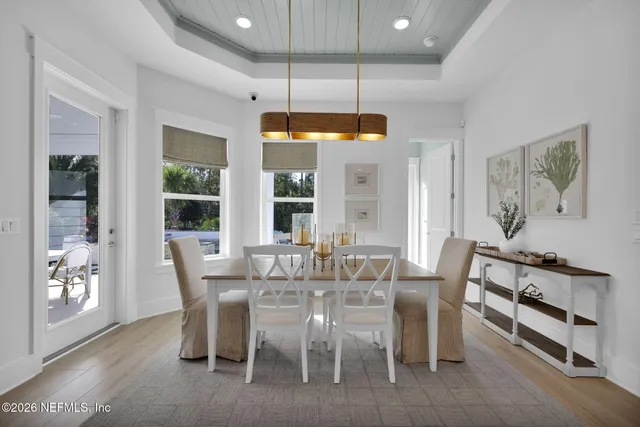 a bathroom with a sink a toilet a shower and a mirror