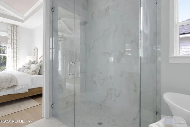 a view of a house with a yard patio and swimming pool