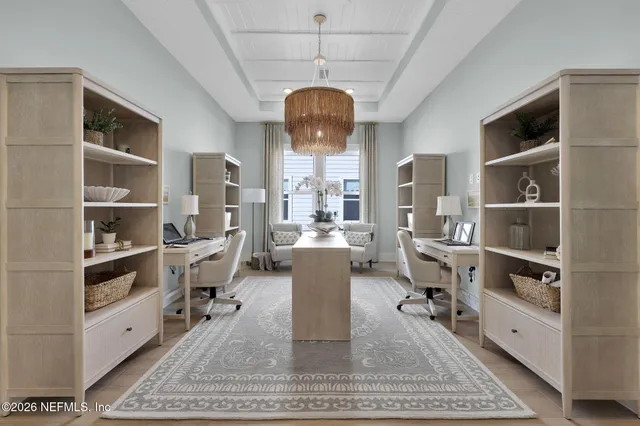 a view of dining room and hall with wooden floor