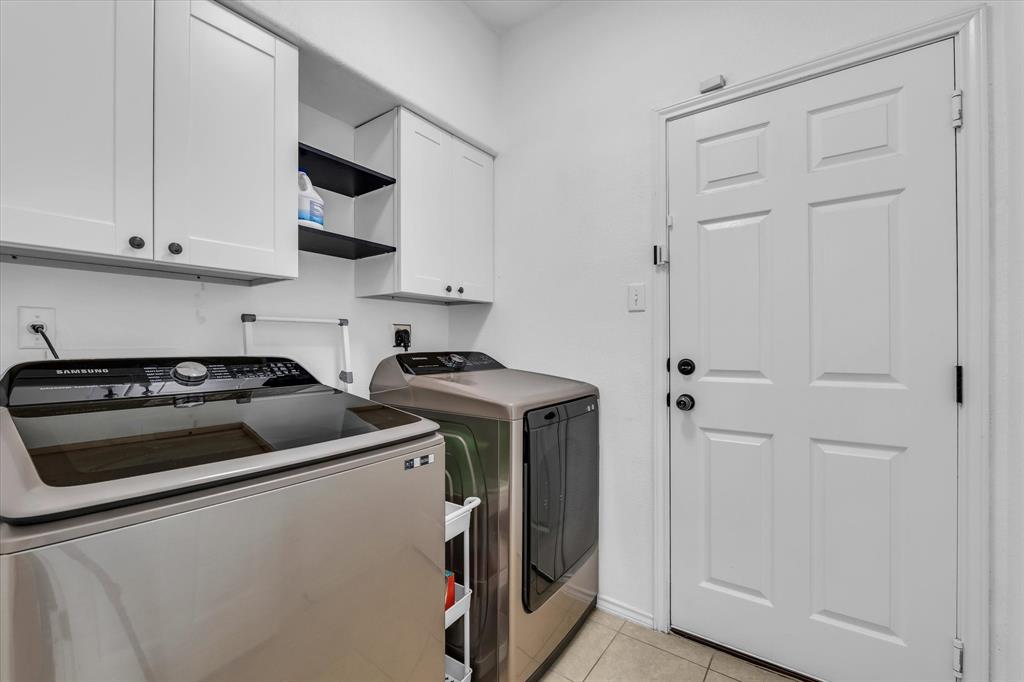 9453 Centennial Drive Waco, TX 76708 - Photo 21 of 37 a utility room with dryer and washer