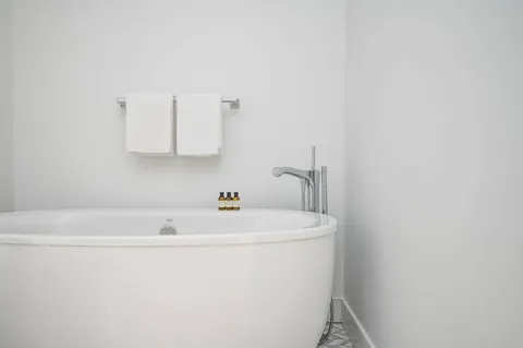 a bathroom with a sink and a bathtub