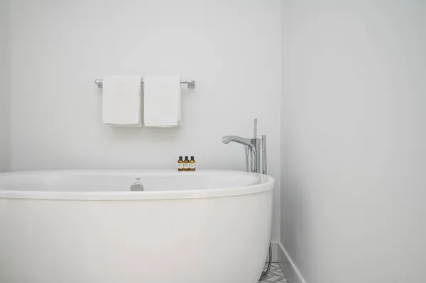 a bathroom with a sink and a bathtub