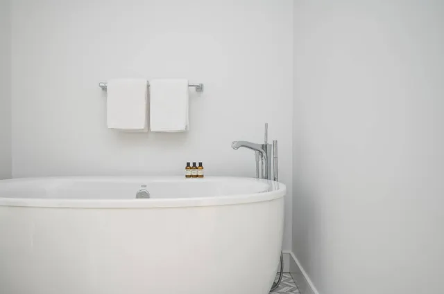 a bathroom with a sink and a bathtub