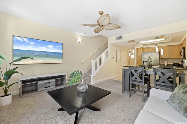 a view of a livingroom and dining room
