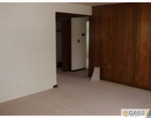 77 Princeton Road Old Bridge, NJ 08859 - Photo 4 of 8 a view of an empty room