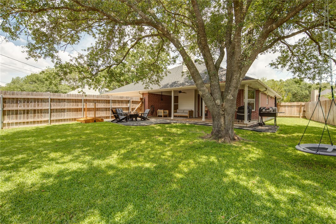 4700 Kensington Road Bryan, TX 77802 - Photo 29 of 31 Large shade tree shading backyard