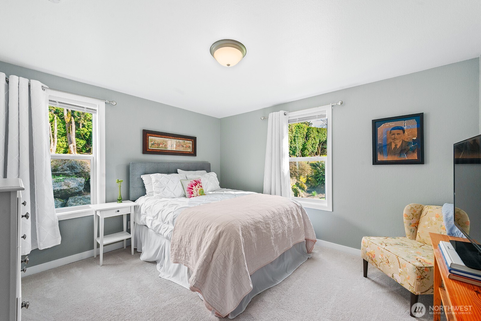 443 Windsor Way Northeast Renton, WA 98056 - Photo 15 of 28 a bedroom with a bed and a window