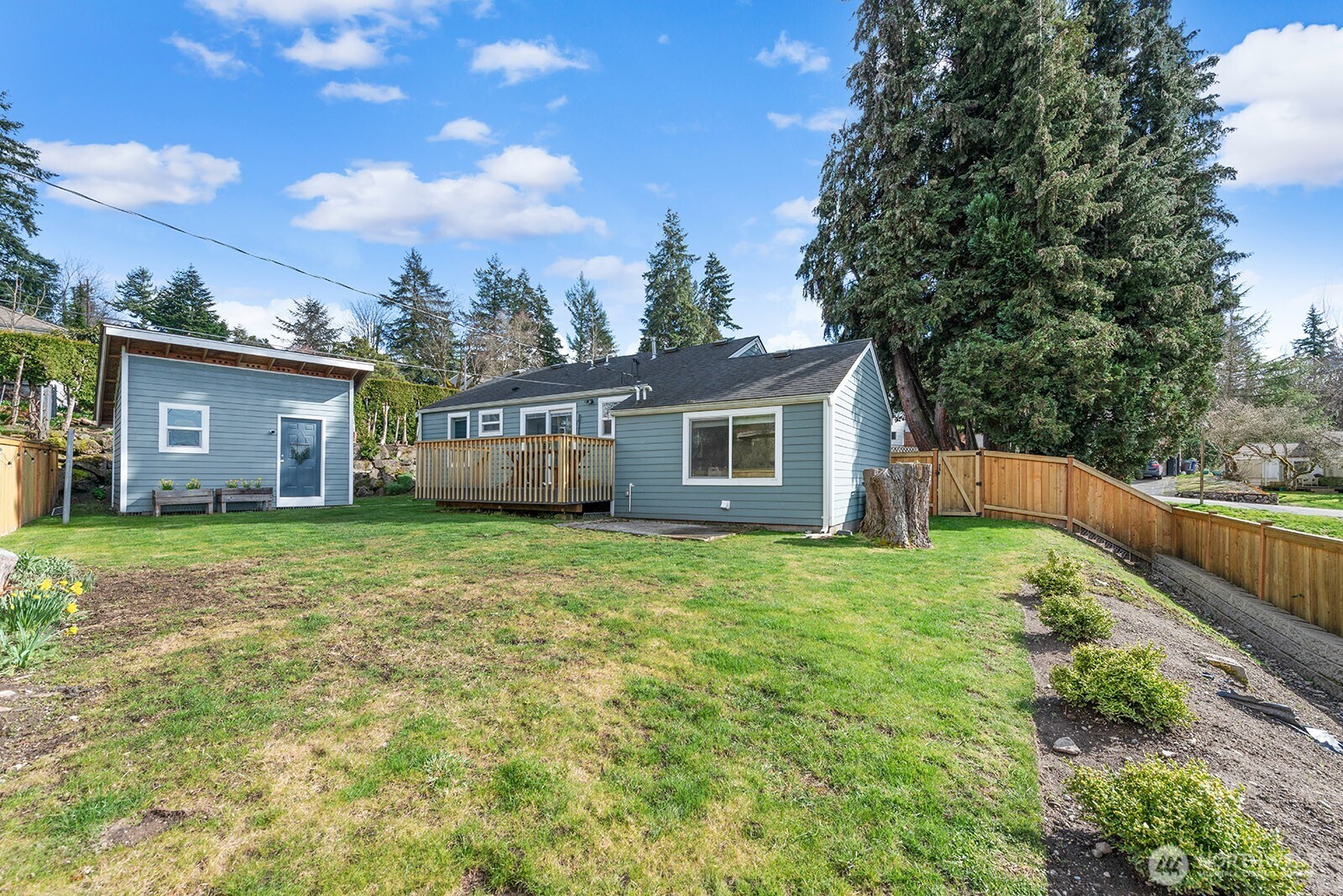 443 Windsor Way Northeast Renton, WA 98056 - Photo 24 of 28 a house view with a garden space
