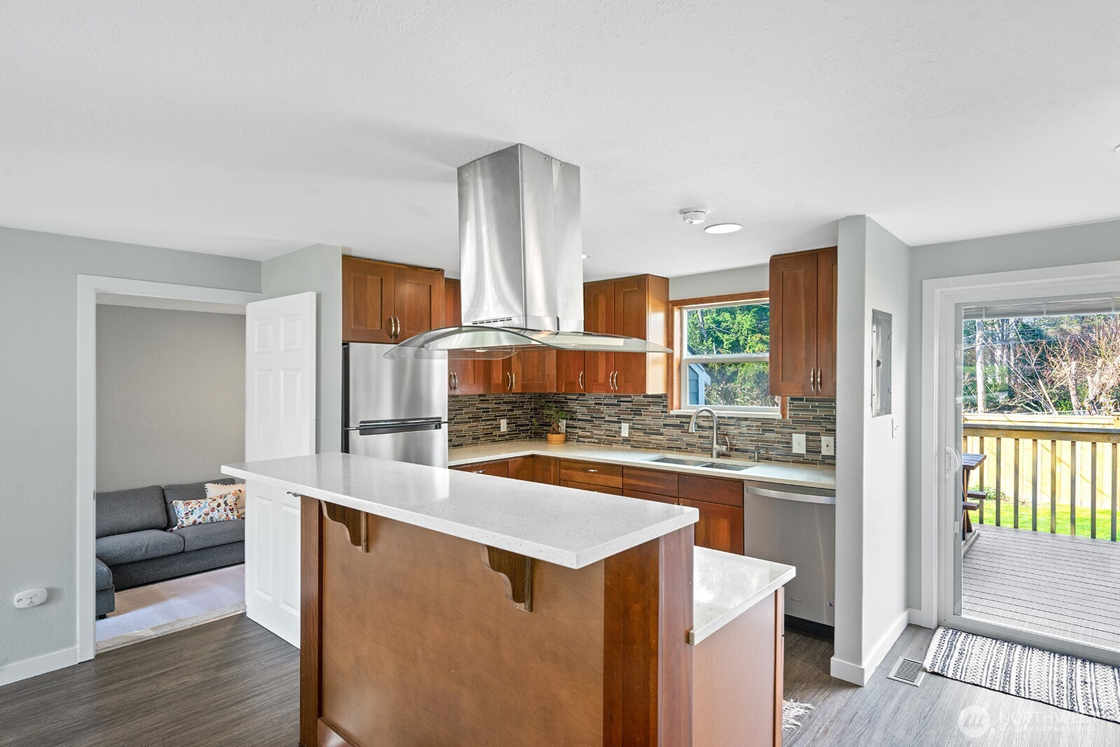 443 Windsor Way Northeast Renton, WA 98056 - Photo 8 of 28 a kitchen with stainless steel appliances granite countertop a stove and a refrigerator