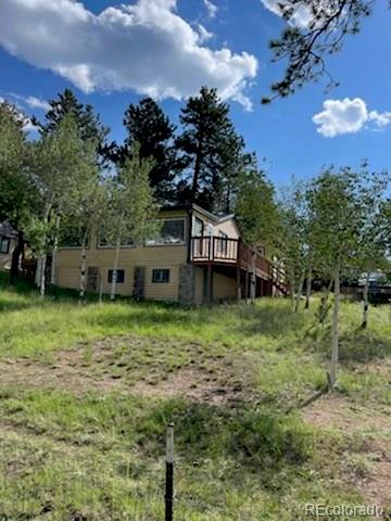 297 Neal Road Bailey, CO 80421 - Photo 14 of 17 a house view with a garden space