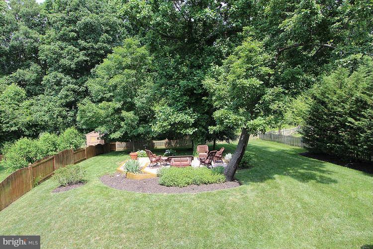 2038 Lord Fairfax Road Vienna, VA 22182 - Photo 23 of 24 a view of a park with large trees