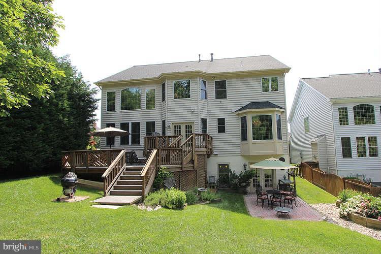 2038 Lord Fairfax Road Vienna, VA 22182 - Photo 24 of 24 a front view of a house with a patio