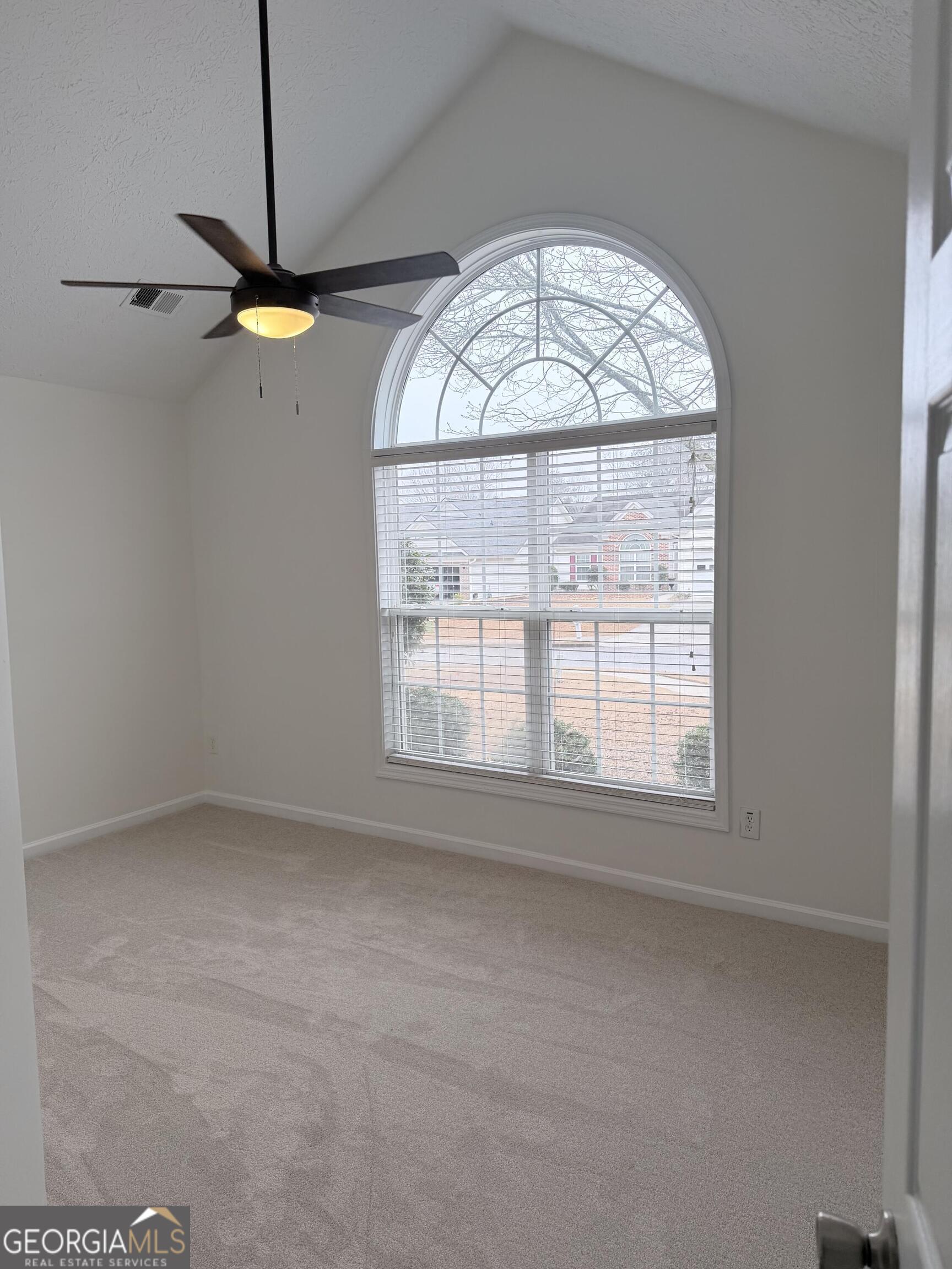 11 Winter Lane Newnan, GA 30265 - Photo 8 of 11 an empty room with a window