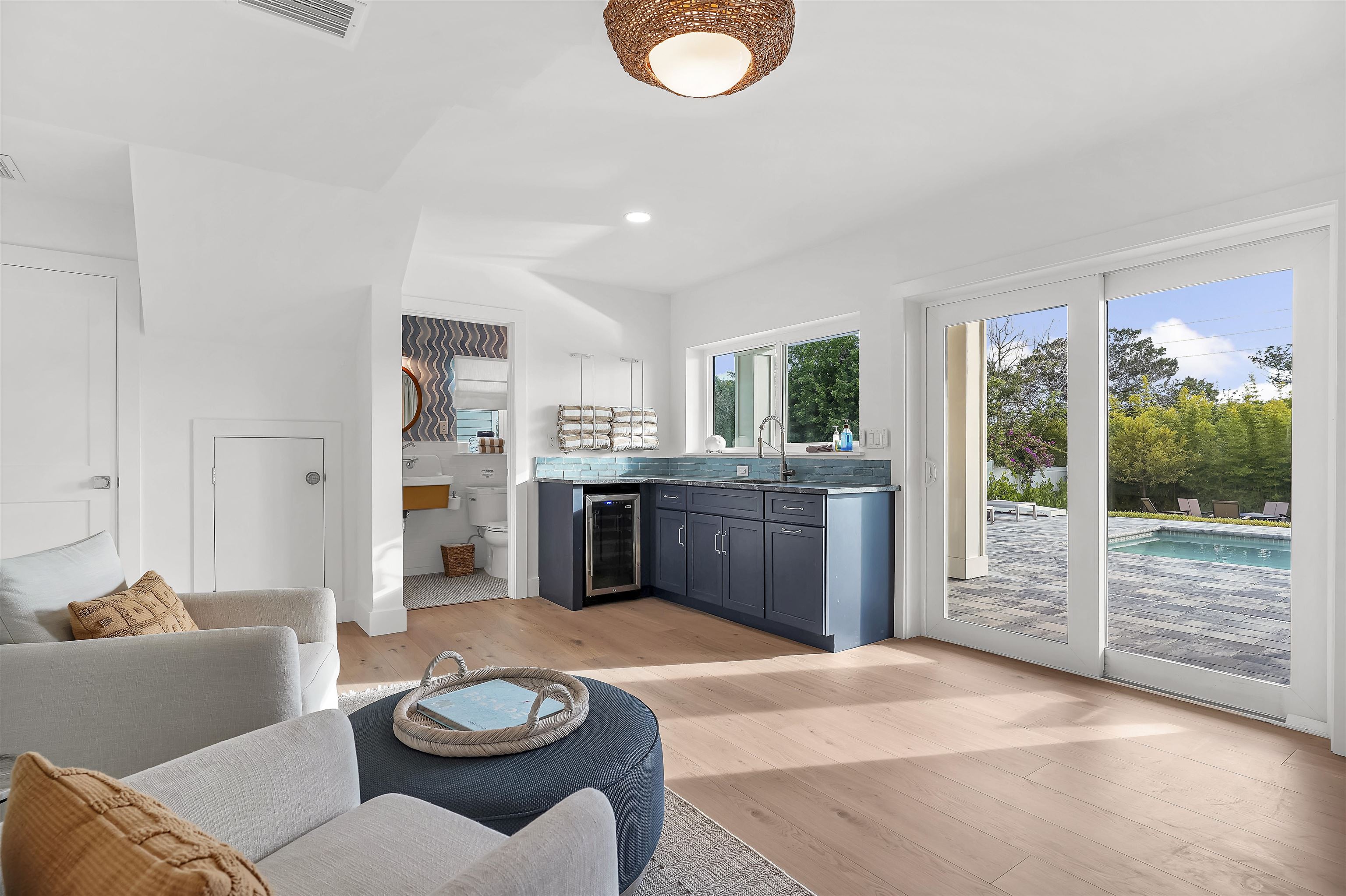 6435 Broward Street St. Augustine, FL 32080 - Photo 13 of 56 a living room with furniture a rug and white walls