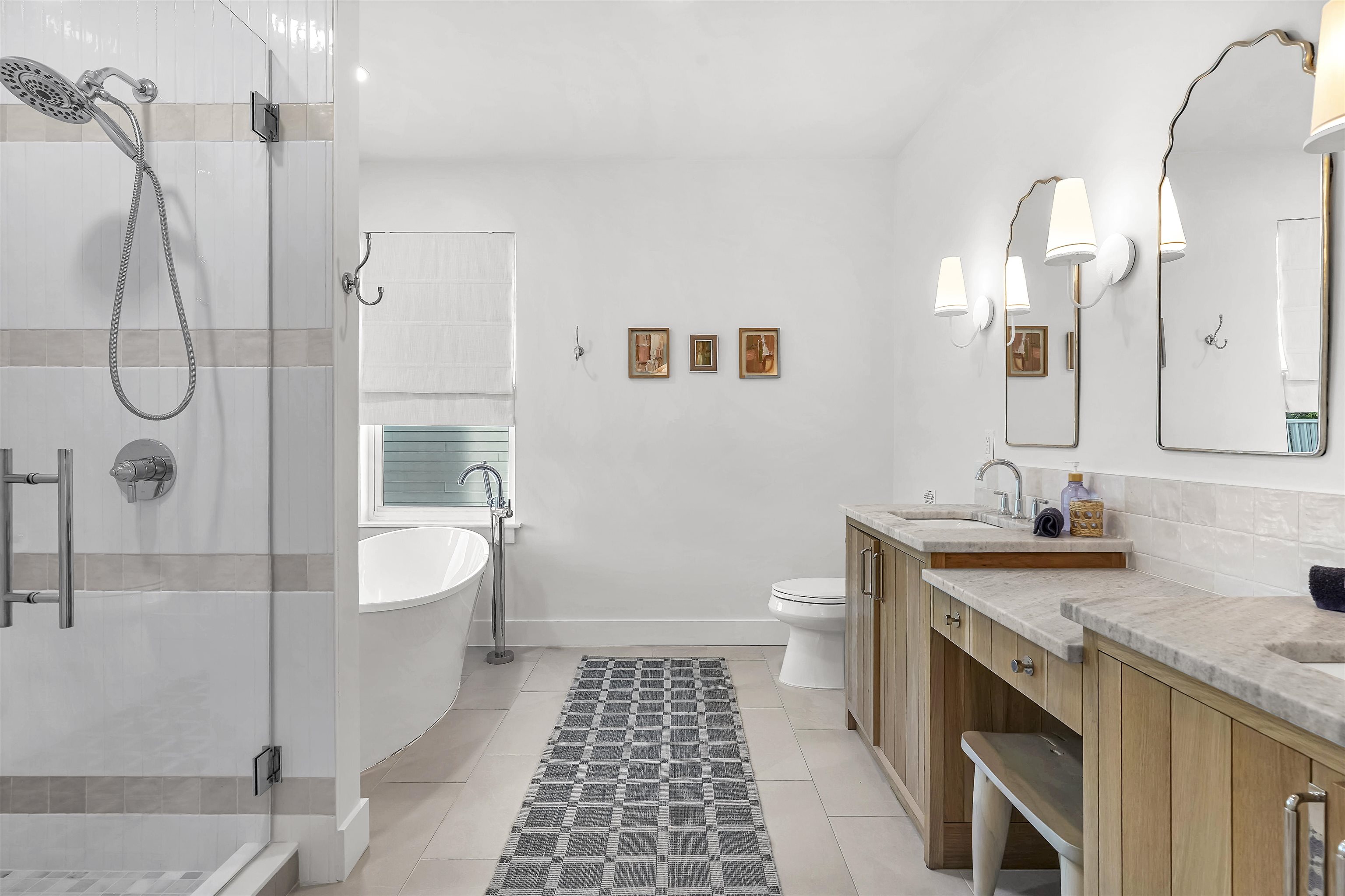 6435 Broward Street St. Augustine, FL 32080 - Photo 19 of 56 a bathroom with a granite countertop sink a toilet a mirror and shower