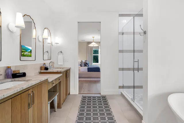 a white bath tub sitting in a bathroom