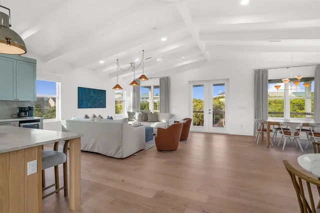 a kitchen with stainless steel appliances a sink stove and refrigerator