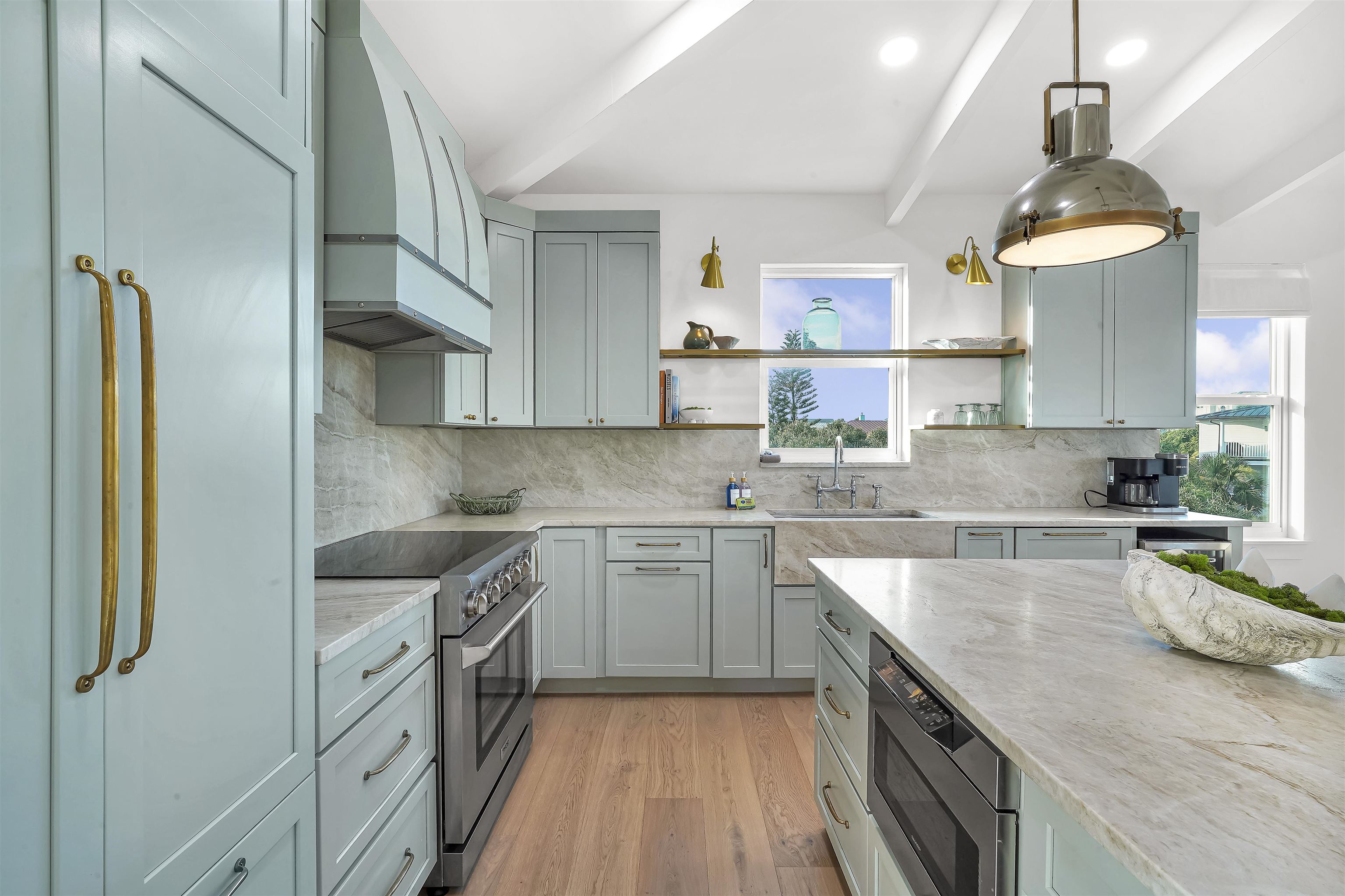 6435 Broward Street St. Augustine, FL 32080 - Photo 32 of 56 a kitchen with stainless steel appliances a sink stove and refrigerator