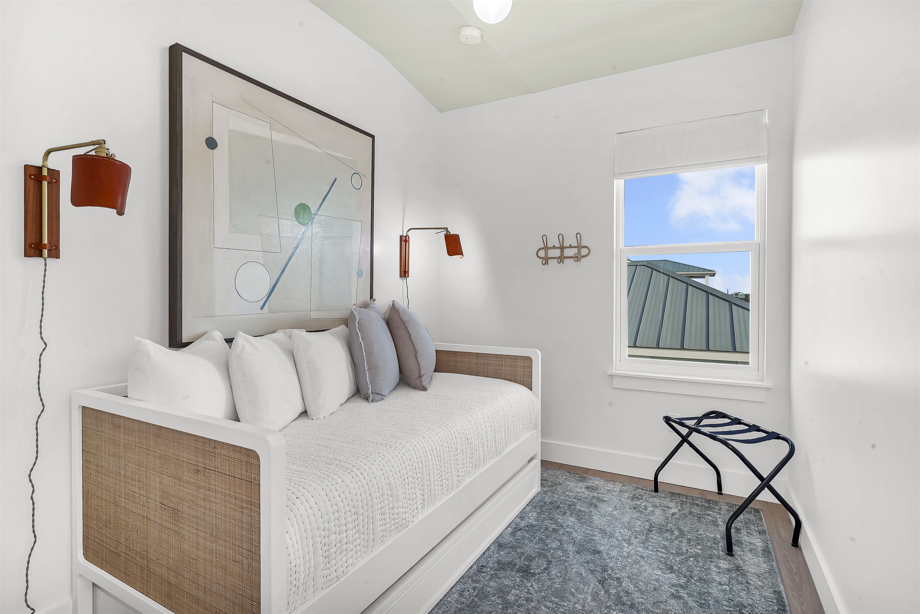 6435 Broward Street St. Augustine, FL 32080 - Photo 38 of 56 a bed room with a bed and a painting on the wall