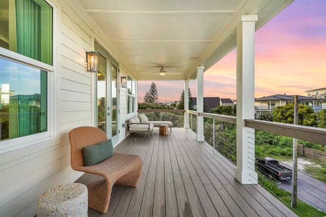 a view of swimming pool with sitting area
